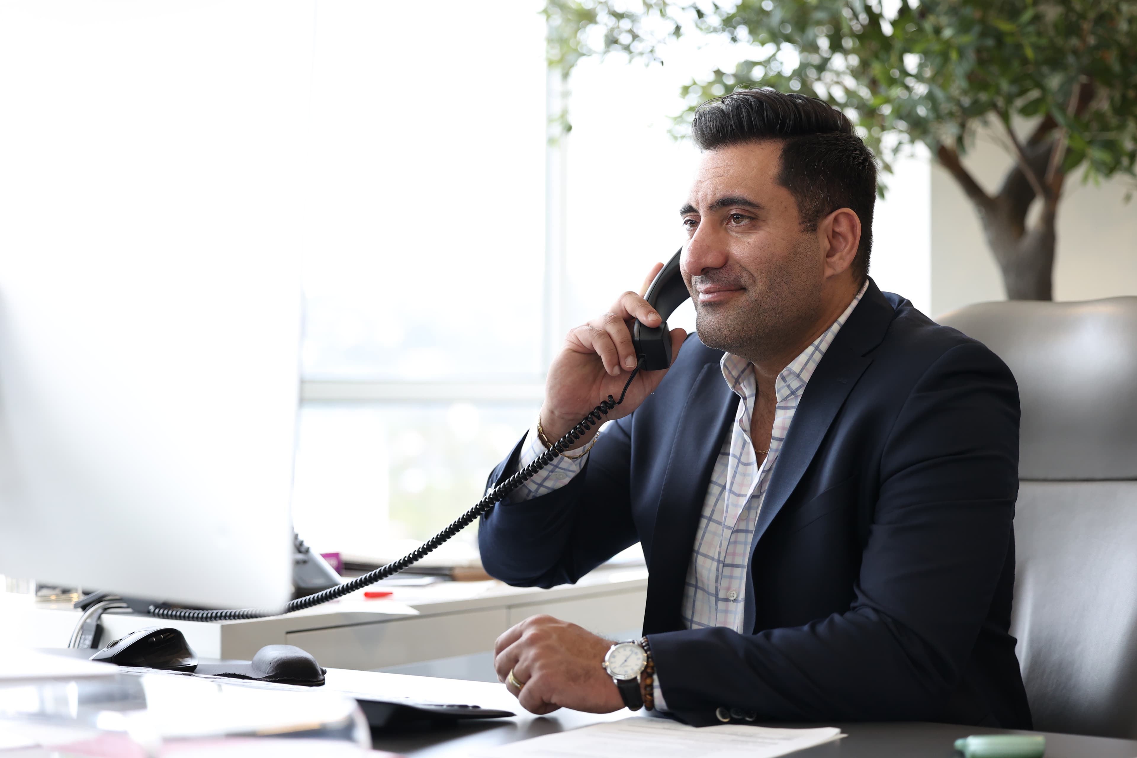 Portrait photo of Michael Madadi